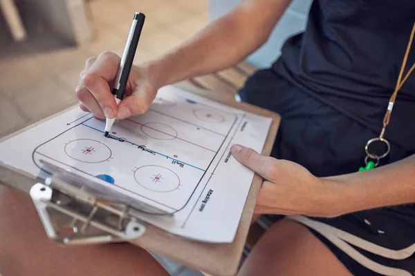 Coach, sports and hands planning on clipboard for game teamwork stratergy. Training manager, fitness leader and healthy lifestyle motivation trainer or athlete plan team coaching formation for match.