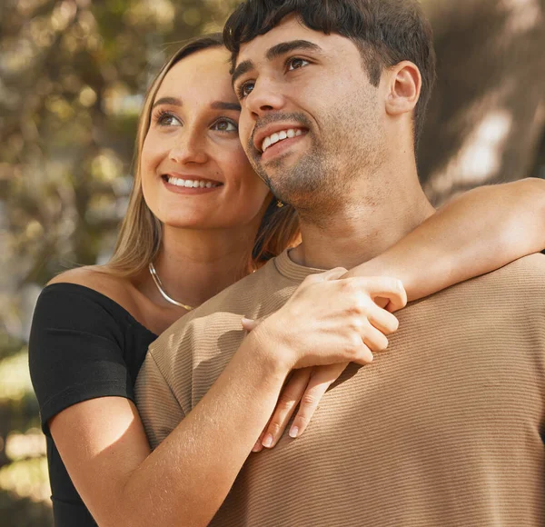 stock image Love, date and view with a couple sightseeing outdoor in nature or a park together in summer. Travel, dating and romance with an attractive young man and woman bonding on holiday or vacation.