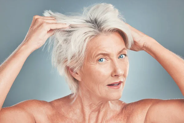 Messy hair, woman and senior model looking for hair care, wellness and salon hairstyle cut. Portrait of an elderly person from Amsterdam with bed head look ready for skin wellness and dye treatment.