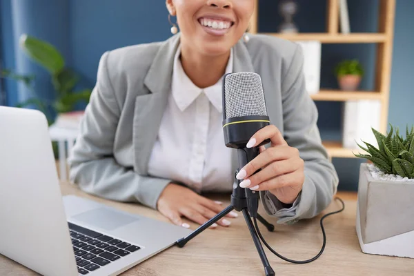 Podcast, laptop and microphone woman with broadcast, news update or live streaming communication in office. Business influencer, journalist or radio speaker mic and technology for a virtual interview.