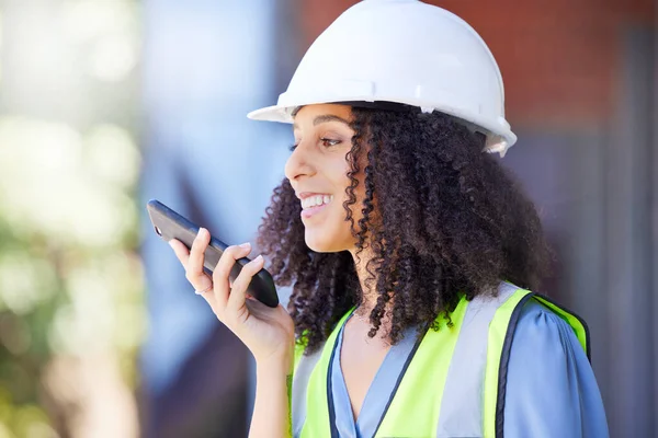 Construction, black woman and phone call with microphone for voice speaker, audio recording and talking for project management, mobile planning and contact. Building logistics manager on smartphone.