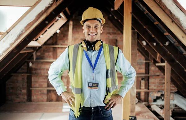 Construction, engineer and happy employee, smile and leadership on construction site or building renovation. Man architect, construction worker and development manager smile for maintenance success.