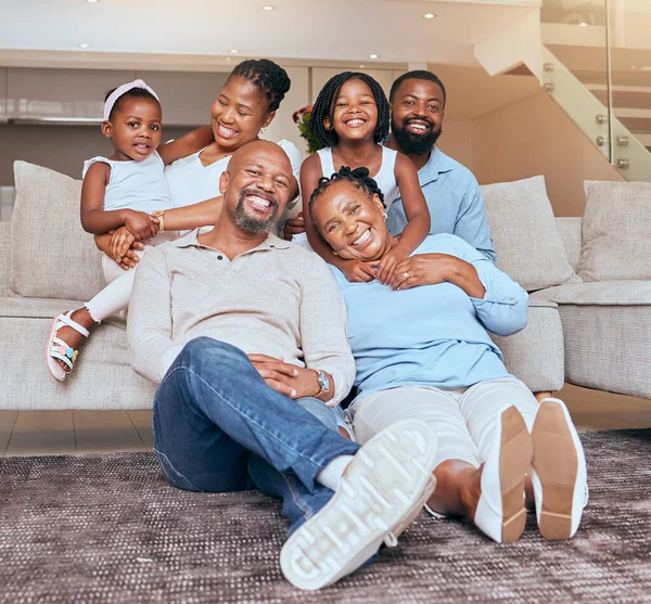 Portrait, big family and african american people bonding with love, care and affection in a family home. Generations, grandmother and grandfather with children and parents at home while relaxing.
