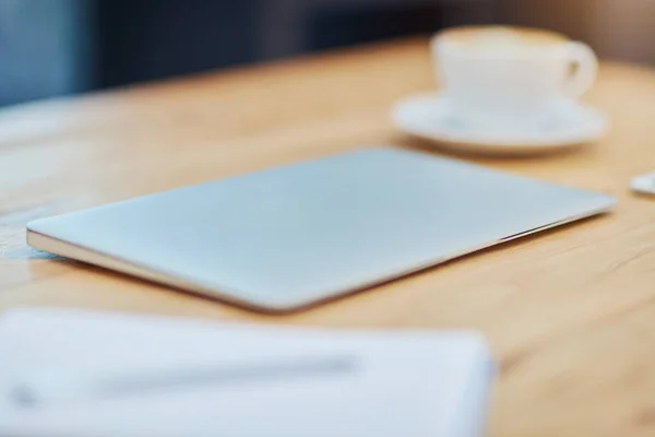 stock image Technology at the ready. Still life shot of a laptop at a workstation in an office