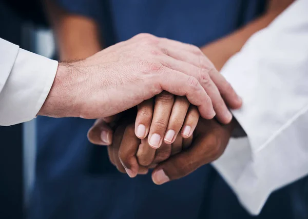 stock image Support, solidarity and hands stacked of doctors for healthcare, communication and teamwork at a hospital. Community, medicine and clinic employees with a goal, trust and medical cooperation.