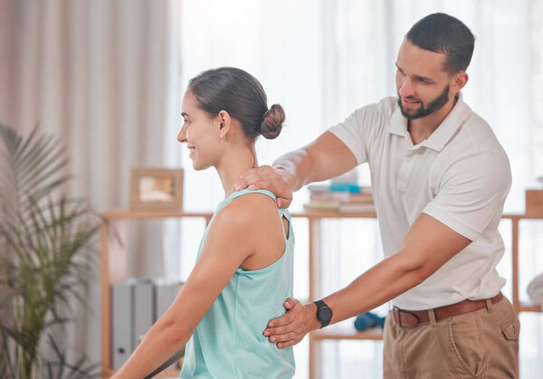 Chiropractor, woman and massage for physical therapy, health and posture at wellness clinic. Doctor, girl and spine alignment for medical, chiropractic or rehabilitation with help in physiotherapy.