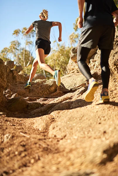 stock image Time for a trail run. a young couple out for a trail run