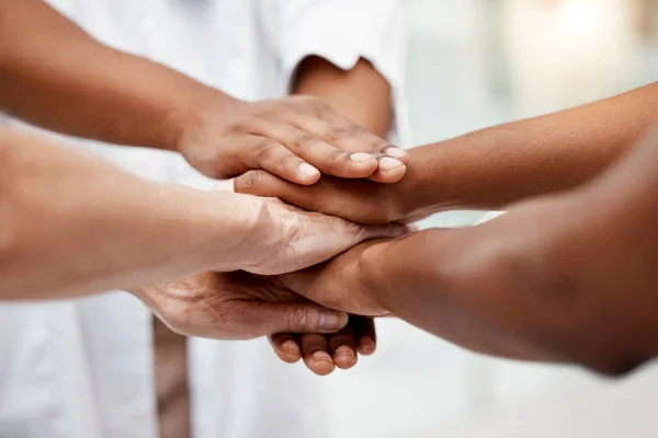 Hands, community and care in trust, agreement or care for teamwork, collaboration or growth together. Hand of business people piling for partnership, unity or support in solidarity for commitment.