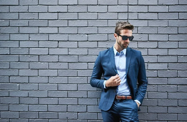 Hes Got Look Handsome Young Businessman Standing Grey Facebrick Wall — Stock fotografie