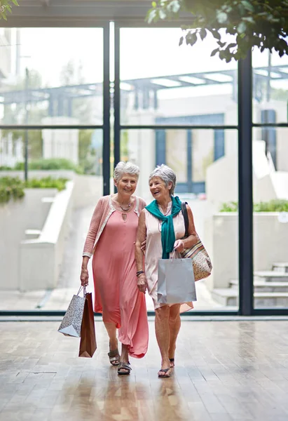 Did you get everything you wanted. Full length portrait of a two senior women out on a shopping spree