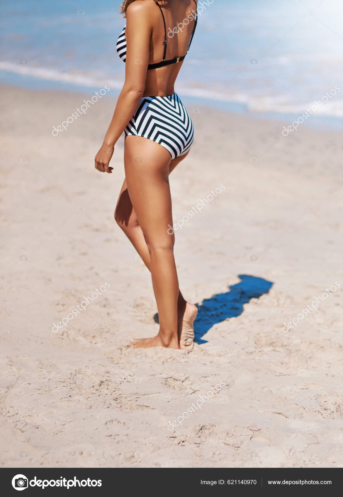 Life Better Little Sand Your Toes Young Woman Her Bikini Stock Photo by  ©PeopleImages.com 621140970