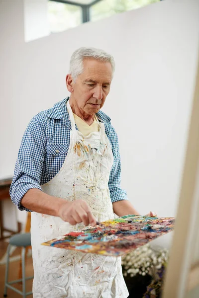 Created Create Senior Man Working Painting Home — Stock Photo, Image
