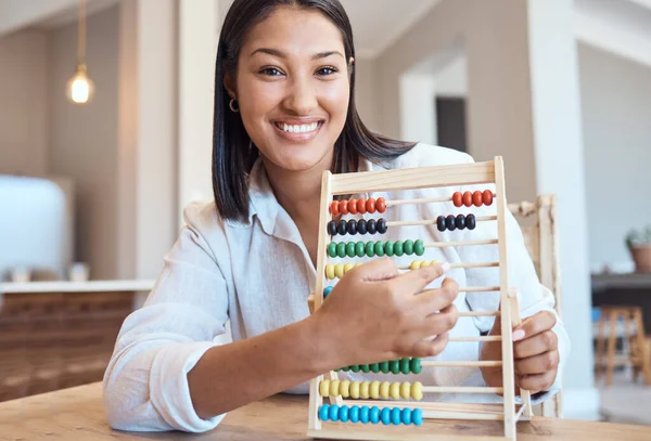 Video call, woman or teacher with math abacus in lockdown homeschool lesson, webinar classroom or education learning. Portrait, smile or happy tutor vlog teaching quarantine students from house study.