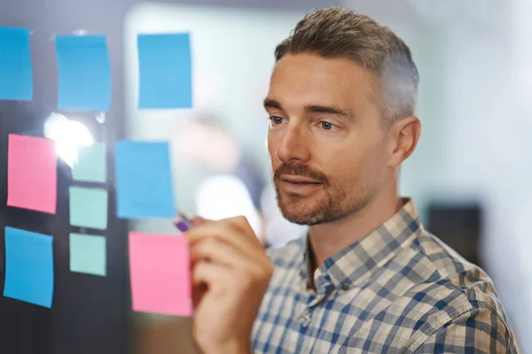 Looks Closely Spot Any Mistakes Male Designer Working Glass Wall — Stock Photo, Image