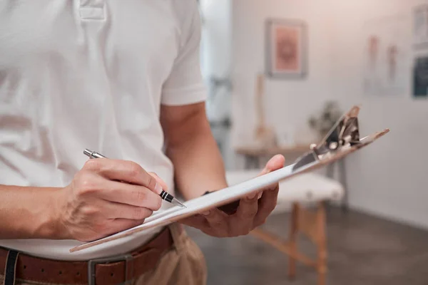 stock image Physical therapy chiropractor and clipboard writing data of spa massage consultant or insurance note. Physiotherapy hands, healthcare consulting note and physio checklist schedule in a health clinic.