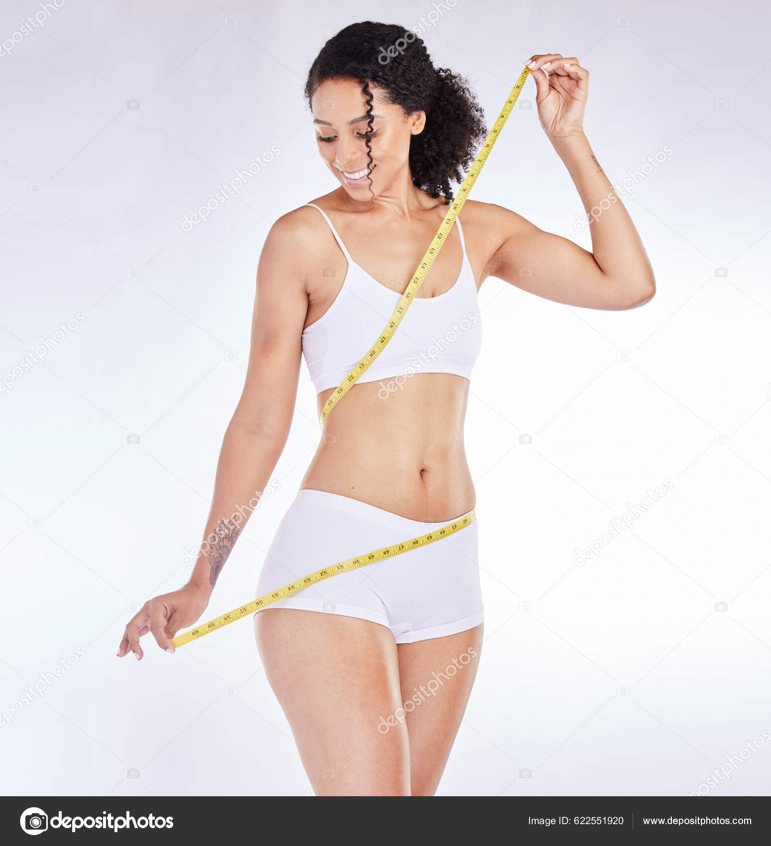 Black Woman Tape Measure Smile Weight Loss Waist Body Care Stock Photo by  ©PeopleImages.com 622551920