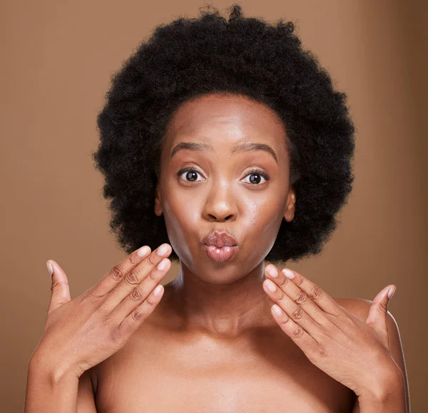 Black woman, beauty and skincare, pout and lips botox and aesthetic cosmetics on studio background. Portrait of young african girl, lip filler and kissing face, plastic surgery and facial treatment.