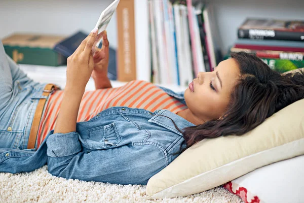 Wireless Stressless Young Woman Using Her Digital Tablet While Lying — Stock Photo, Image