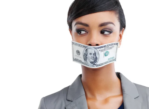 stock image Everyone has their price. a young businesswoman standing with a 100 dollar bill over her mouth against a white background