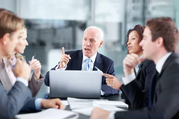 Discussing Next Corporate Move Corporate Executives Sitting Table Meeting Using — Stock Photo, Image