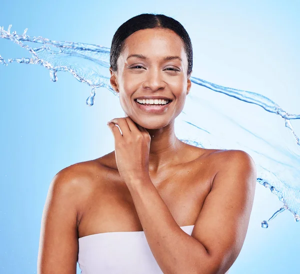 Shower, water and black woman with splash to clean, beauty and hygiene portrait with wellness and skincare against studio background. Healthy skin, fresh and hydration, moisture and wet water splash