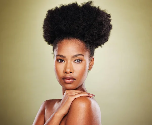 Selective focus on hair. Portrait of a young afro woman with box