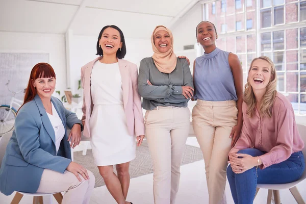 stock image Diversity, women and portrait of a team in the office in meeting, team building or project planning. Happiness, collaboration and work friends standing together in their coworking space in workplace