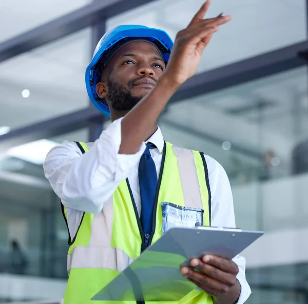 Architecture, checklist and inspection with construction worker planning for engineering, designer and building. Industrial, leadership and safety with black man for property, maintenance and vision.