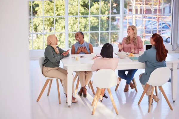 stock image Collaboration, food and team building with a business woman group sitting around a table for eating. Meeting, partnership and lunch with a female employee group in the office for planning or strategy.