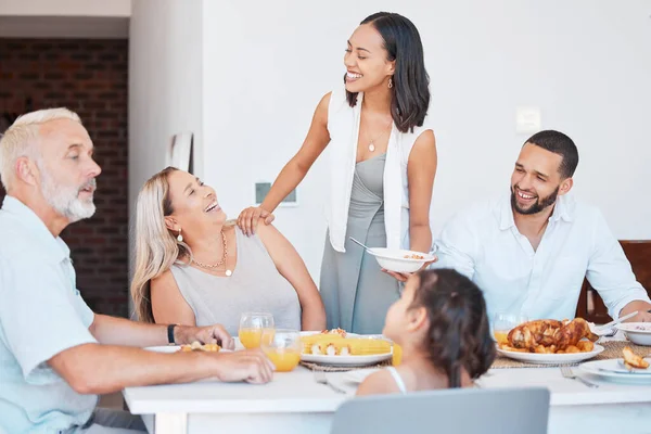 Happy family, eating lunch food and dinner table meal, social gathering or family lunch in dining room together. Smile, happiness and meal celebration, brunch and quality time to enjoy in family home.