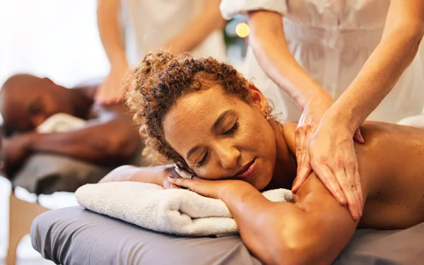 Couple massage, hands or spa therapist for relax, luxury or wellness treatment for health, lifestyle or zen at resort. Healthcare, beauty salon or black woman and man for body, skincare or therapy.