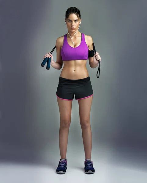 Working Hard Her Fitness Studio Shot Sporty Young Woman Gray — Stock Photo, Image