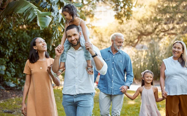 Big family, garden and bonding with children, grandparents and siblings during summer on holiday. Grandfather, grandmother and parents walking through forest for loving, caring fun with kids.