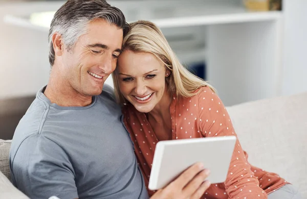 Have You Seen Affectionate Mature Couple Relaxing Digital Tablet Home — Stock Photo, Image