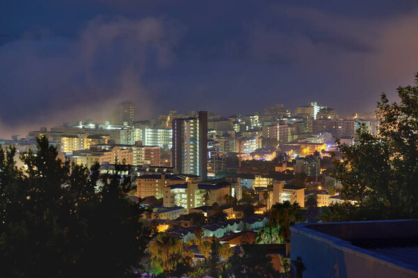 The city comes alive at night. View of a city landscape at night