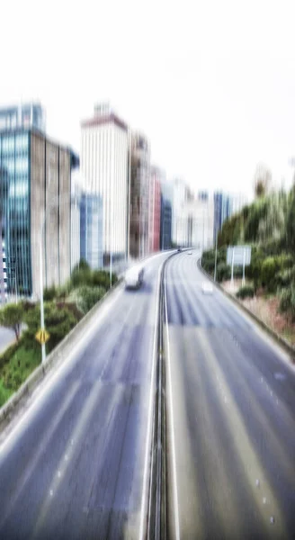 Blurred city background. Motion and lens blurred city images - from details to sky scrapers
