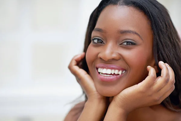 stock image Flawless and radiant. A young woman during her daily beauty ritual