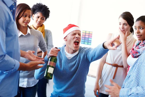 Bad, office and party with business team looking uncomfortable by colleague drunk behaviour in office. Business people, judging and confused by alcoholic employee being silly at their work event.