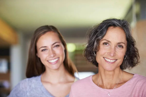 stock image I learnt it all from my mom. Portrait of a beautiful mother and daughter standing in their home