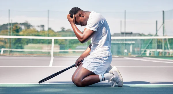 stock image Tennis court, mistake and black man with depression, stress and mental health problem of anxiety after sports training, workout and exercise. Athlete model sad after loss, failure and burnout outdoor.