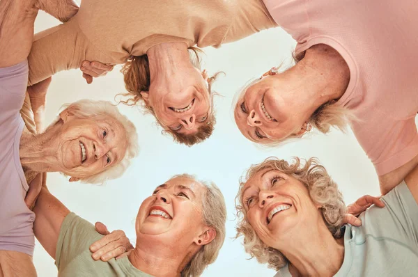 Fitness, goals and senior women in a circle for team building, motivation and community support. Retirement, below or happy elderly friends with mission after yoga class training, workout or exercise.