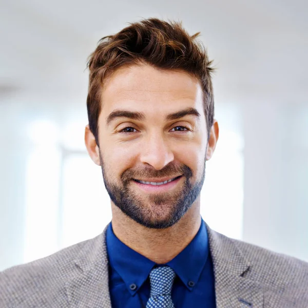 Stock image So much to feel good about. Portrait of a man in a contemporary suit