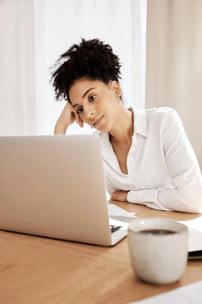 Business woman, depression and laptop with anxiety, mental health and stress for online report in home office. Black woman, frustrated, bored or burnout of work, personal life or bad news on email.
