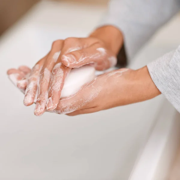 Shes germ-free now. a woman washing her hands with soap