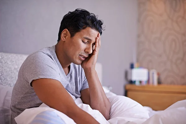 stock image Theres no place like home. a handsome young man trying to get some rest in bed