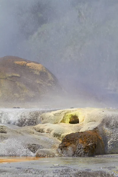 stock image The beauty of Mother Nature. mist descending over a rocky tidal pool