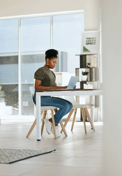 Black woman, laptop and working in home office for startup business entrepreneur, work from home expert or remote research manager. African girl, typing email or seo employee on computer at home.