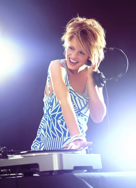 Her beats will blow your mind. a gorgeous young female dj