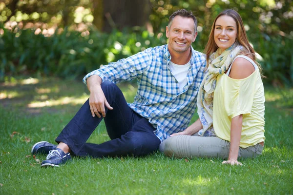 stock image They always make time for each other. Portrait of an affectionate couple outside in the summer sun