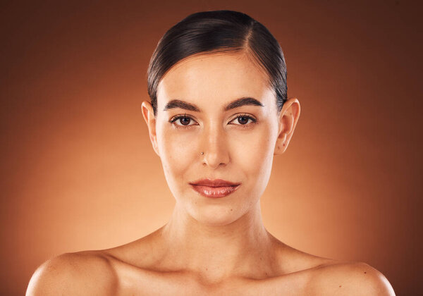 Skincare, beauty and face portrait of Latin woman for luxury spa, wellness and dermatology in studio. Cosmetics, makeup and girl pose for beauty products, skincare products and facial treatment.
